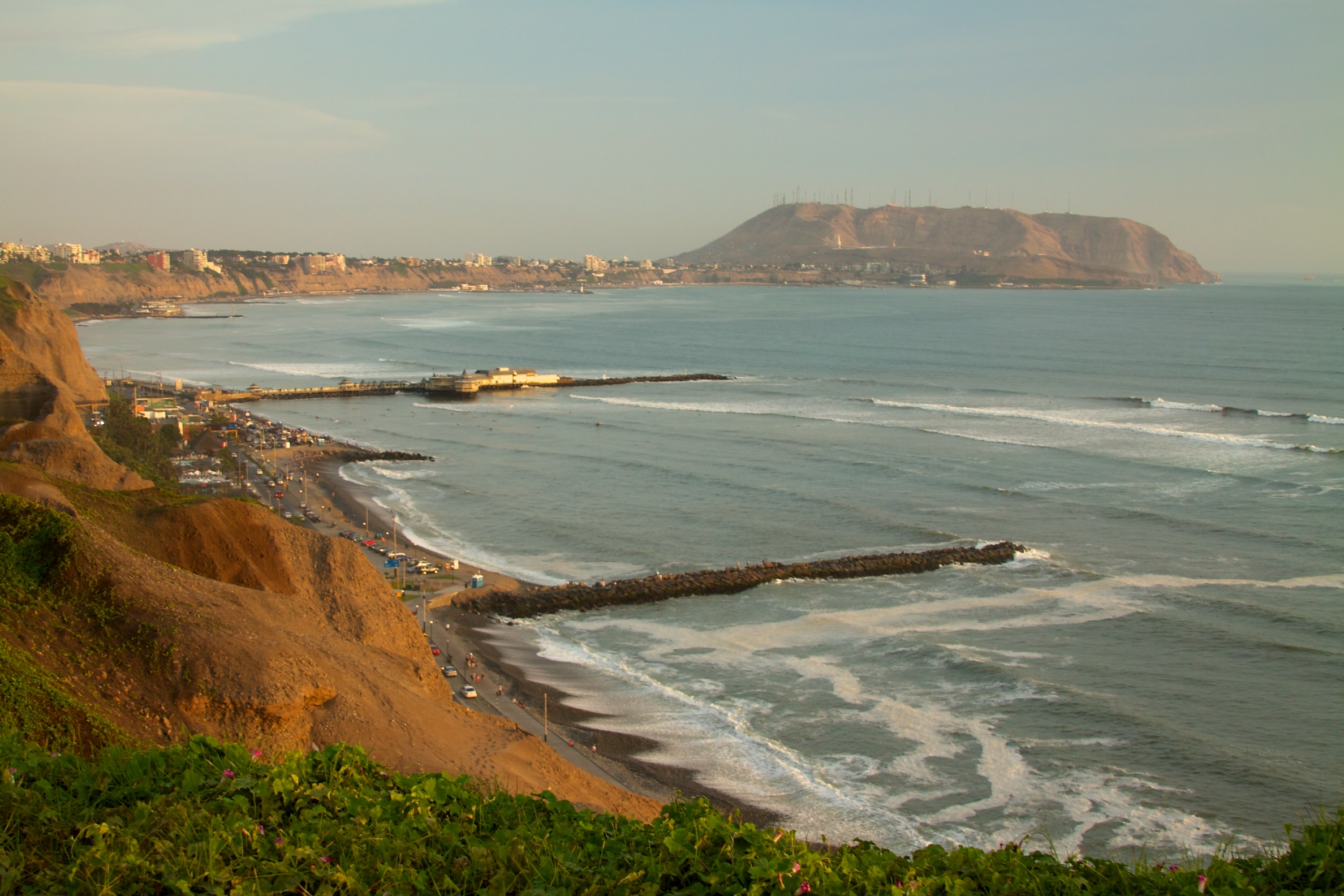 Evening light over Lima's Pacific coastline and sea cliffs